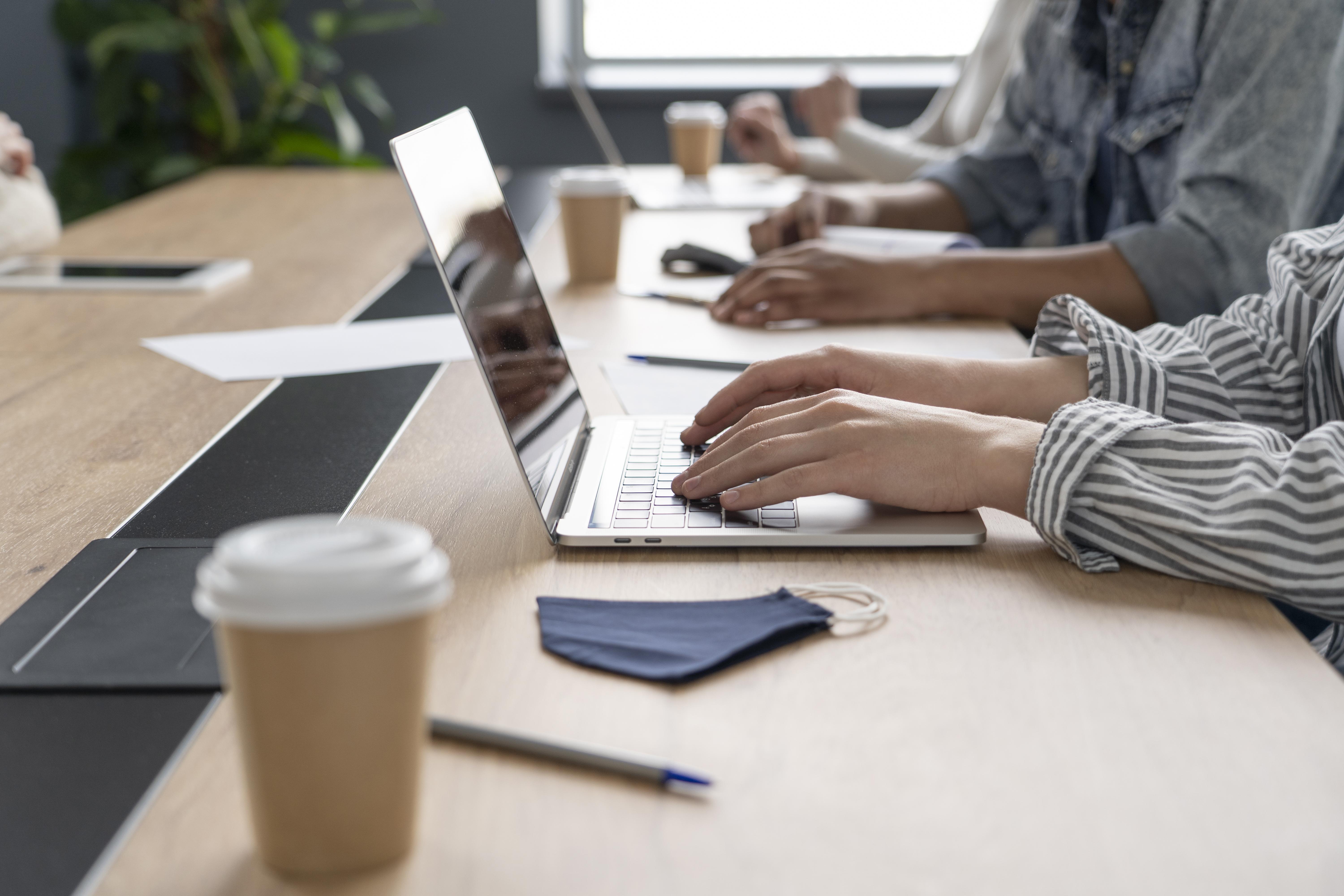 people-working-while-respecting-social-distancing-restriction